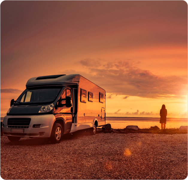 RV trailer in sunset